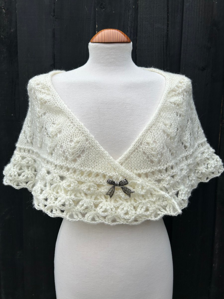 Hand knitted light cream shallow triangle lace shawl with crochet edging 