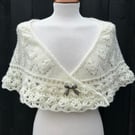 Hand knitted light cream shallow triangle lace shawl with crochet edging 
