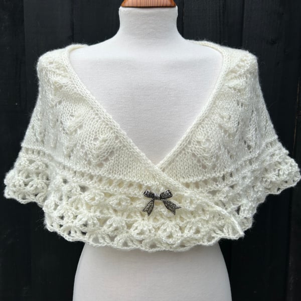 Hand knitted light cream shallow triangle lace shawl with crochet edging 