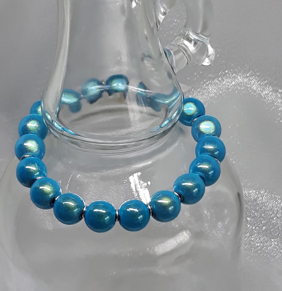 BR268 Shimmering blue miracle bead bracelet
