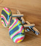 Retro style black, red and yellow striped cufflinks.