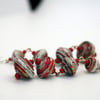 Long graded round paper bead earrings