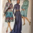 A sewing pattern for a misses' dress in 2 lengths in size 14 (Simplicity 9447)