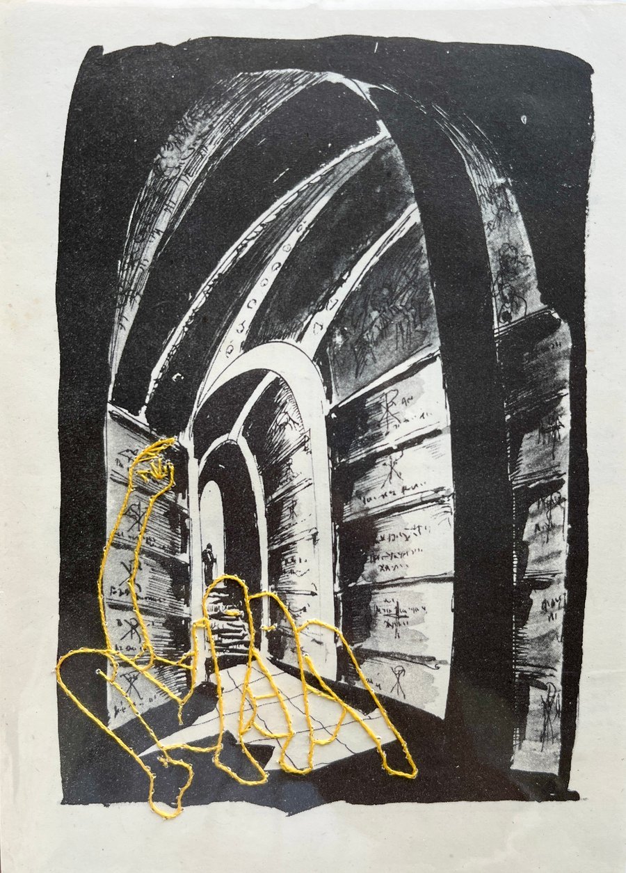 Hand embroidered vintage book page