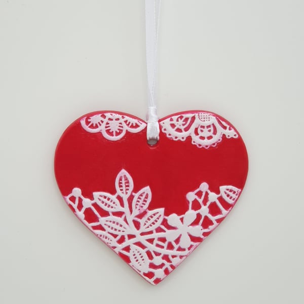 Red love heart clay hanging decoration with textured lace design 
