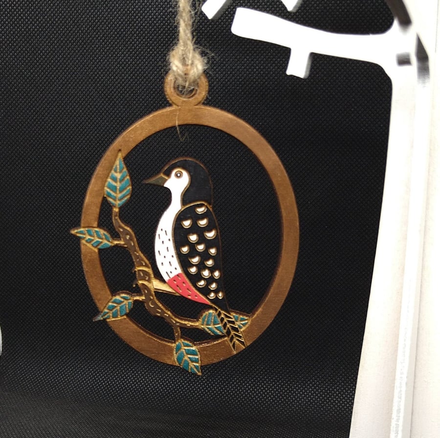 Wood Pecker, hanging decoration, hand drawn and laser etched and cut.