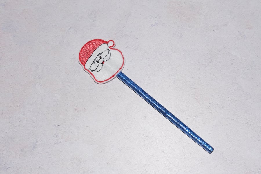 embroidered santa face pencil topper complete with pencil