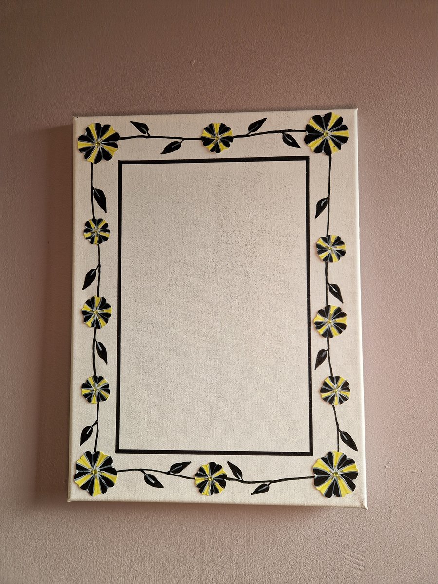 Canvas picture frame featuring bumble bee petunias 