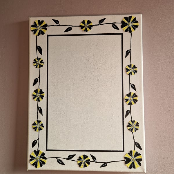 Canvas picture frame featuring bumble bee petunias 