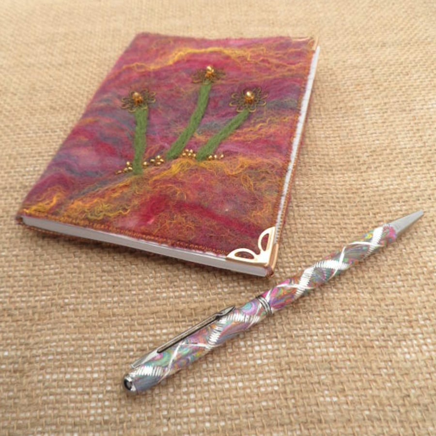 Notebook, felt covered with beaded flowers