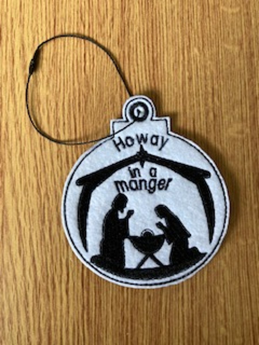 1119. Howay in a manger Christmas tree hanging decoration.