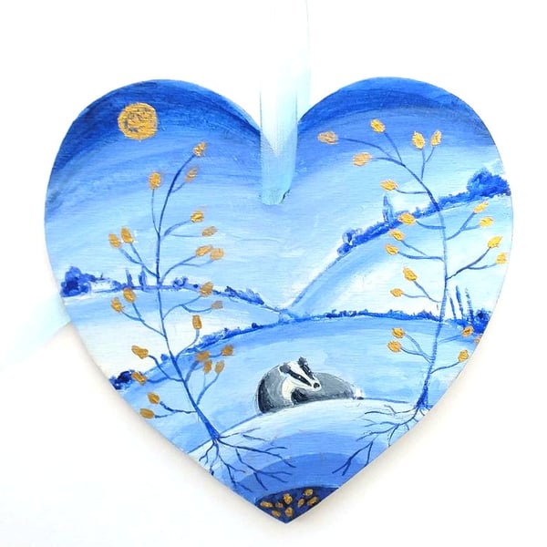 Badger with golden leaved trees  on a wooden heart shape 