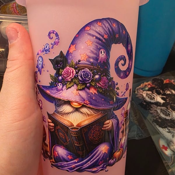 Pink cold cup tumbler with Halloween wizard design, with straw and lid