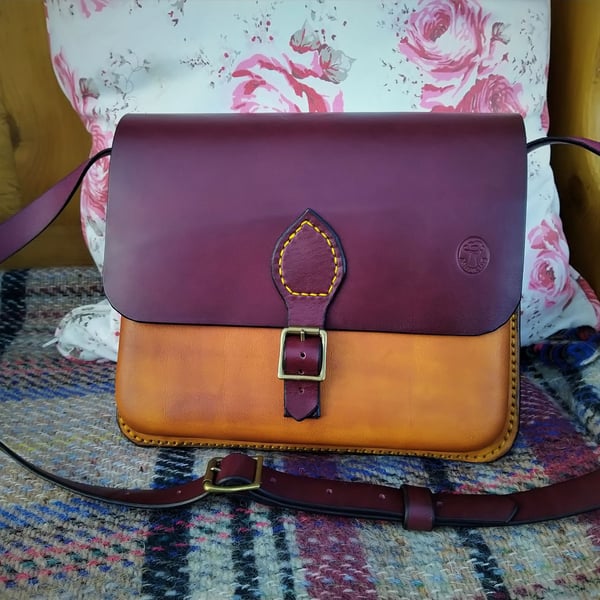 Burgundy and tan leather cross body bag