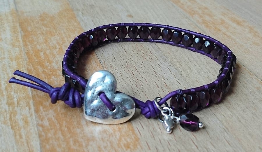 Purple leather and glass bead bracelet with heart button