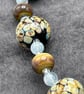 Raku spotted lampwork glass beaded necklace cream brown blue caramel - Image 6