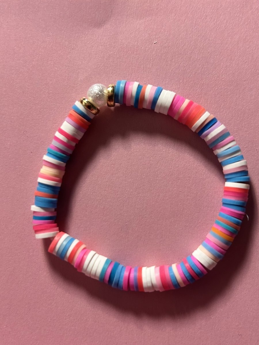 multicoloured bracelet with a pretty pearl