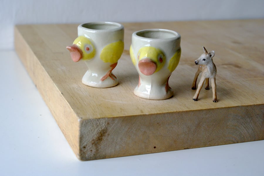 Set of two stoneware egg cups - chicken design glazed in simply clay