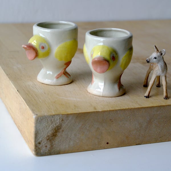 Set of two stoneware egg cups - chicken design glazed in simply clay