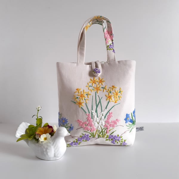 Small handbag or bucket bag upcycled in a floral vintage embroidered table cloth