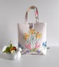 Small handbag or bucket bag upcycled in a floral vintage embroidered table cloth