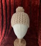 A Fawn, Beige, Wheat Coloured Cosy Crocheted Beanie Hat with detachable Pom-Pom - Image 1