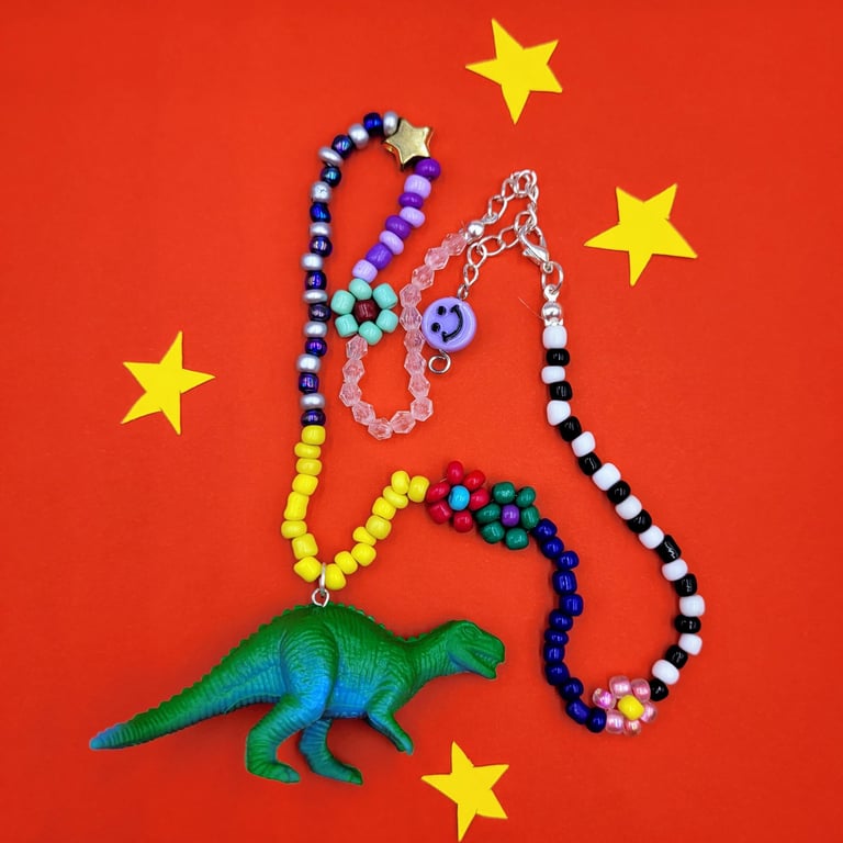 Chunky beaded necklace with up-cycled dinosaur charm