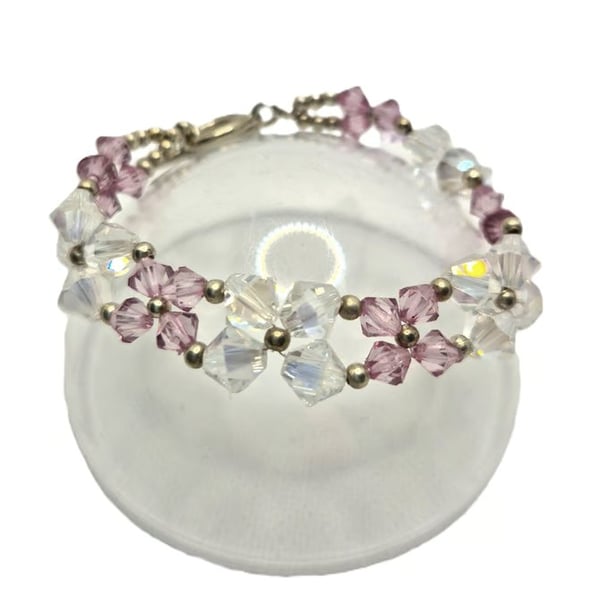 Flower shaped bracelet with clear and pink Swarovski crystals