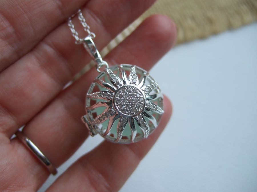 Sea glass marble locket, sun design locket with beach found marble, sparkling