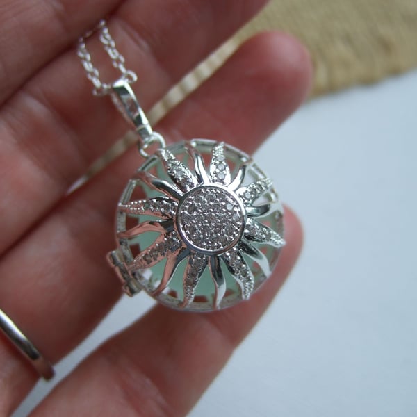 Sea glass marble locket, sun design locket with beach found marble, sparkling