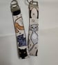 Cat wristlet  - Image 1