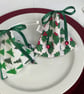 2 Christmas place markers or gift holders for little gifts. Holly & trees