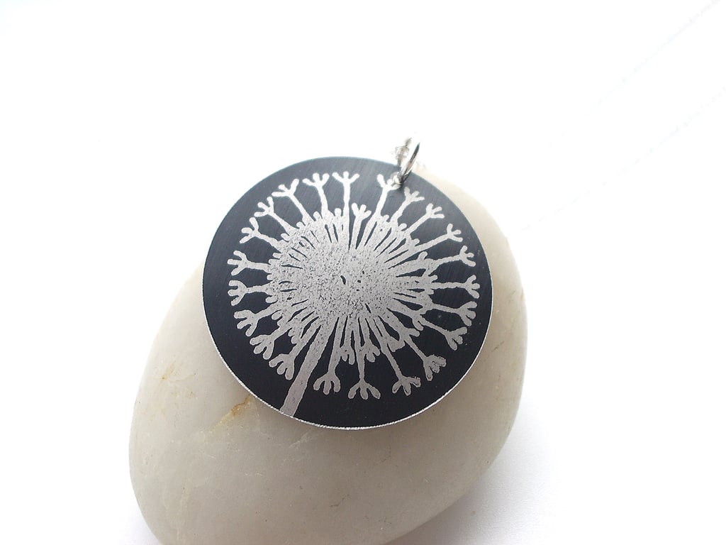 Black seed head disc pendant necklace 