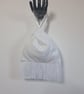 White sequin Japanese Knot bag with 9cm tassel trim and satin lining.