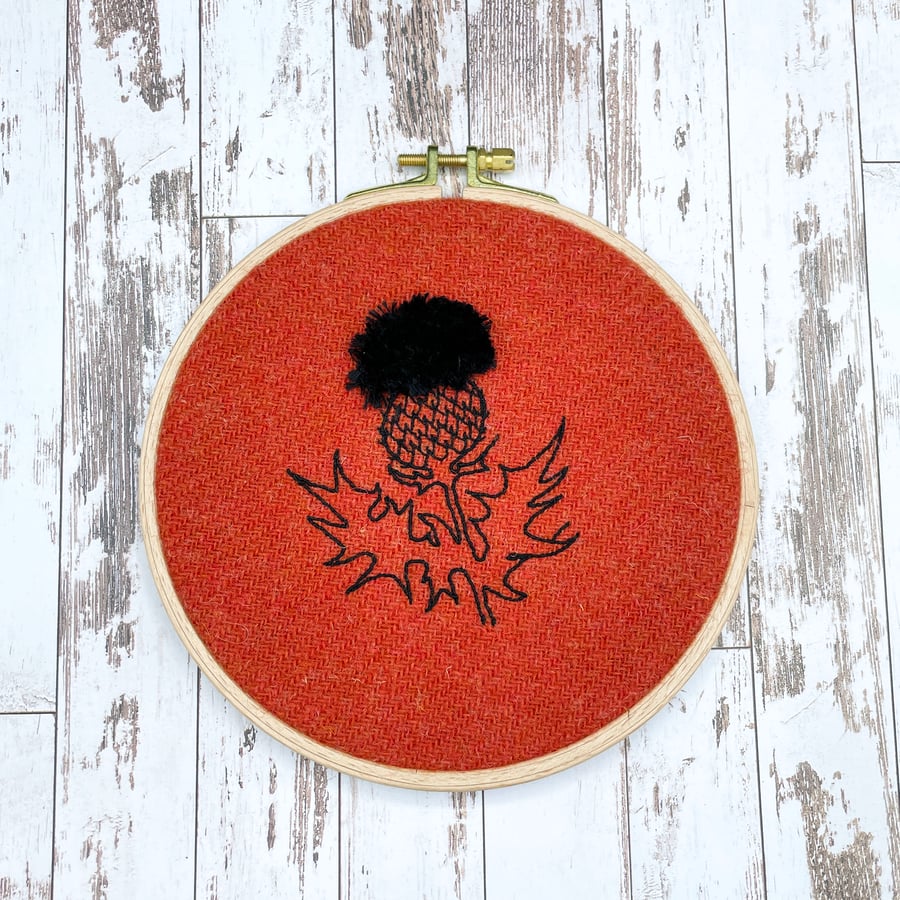 Thistle embroidery art hand stitched on burnt orange Harris tweed
