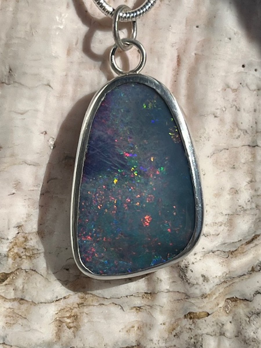 Silver boulder opal pendant