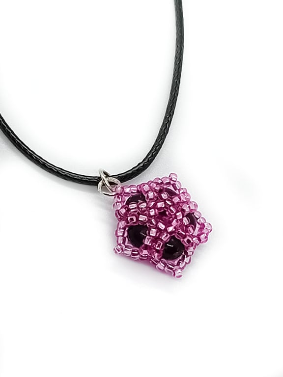 Pink and black beaded flower pendant cord necklace