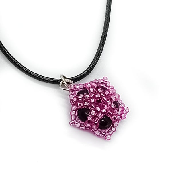 Pink and black beaded flower pendant cord necklace