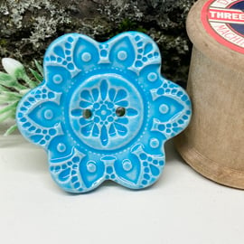 Large ceramic flower shaped button turquoise 