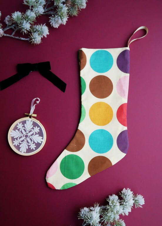 Medium Christmas Stocking in Cream with Large Rainbow POlka Dot Print