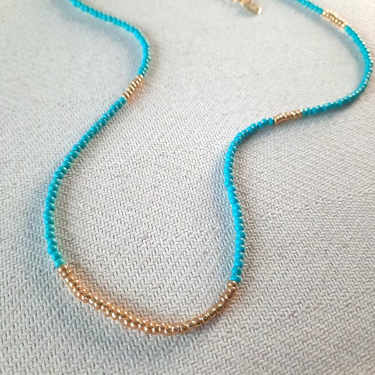 Glass beaded necklace, turquoise and gold, 16 to 18 inches