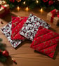 A set of 4 handmade quilted festive coasters