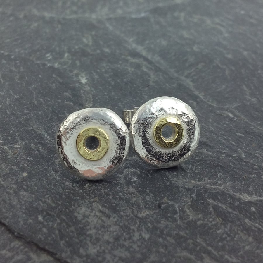 Silver and 18ct gold stud earrings , circular studs