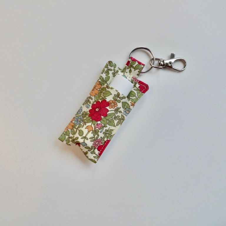 Key ring lip balm holder in colourful floral fabric keyring 