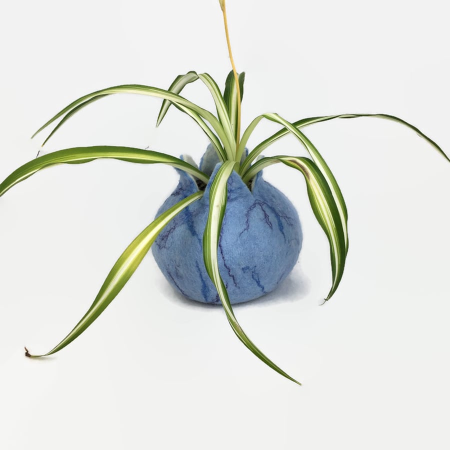 Felted pod in pale blue with silk fibre embellishment
