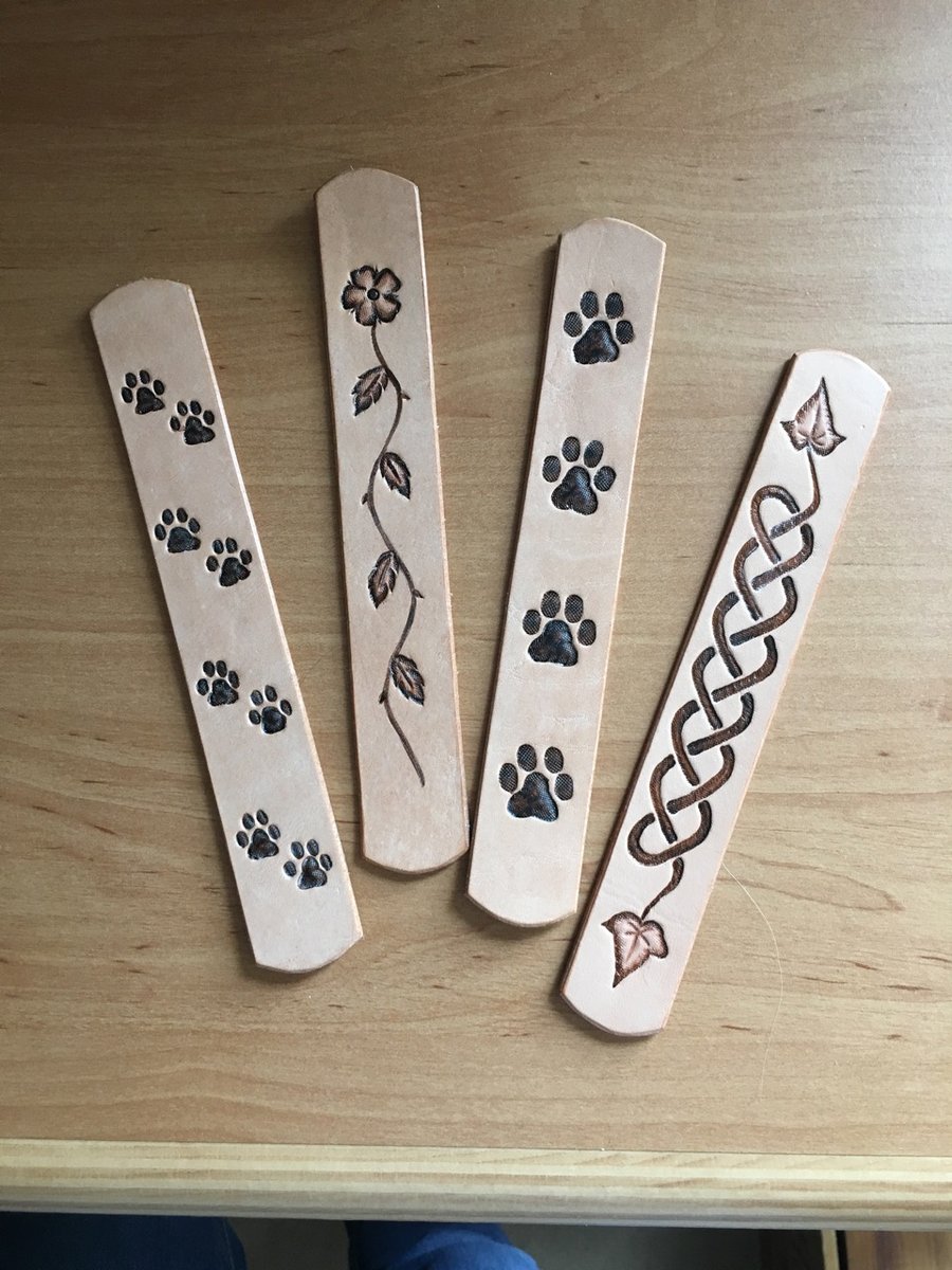 Leather bookmark with hand-painted embossed motif