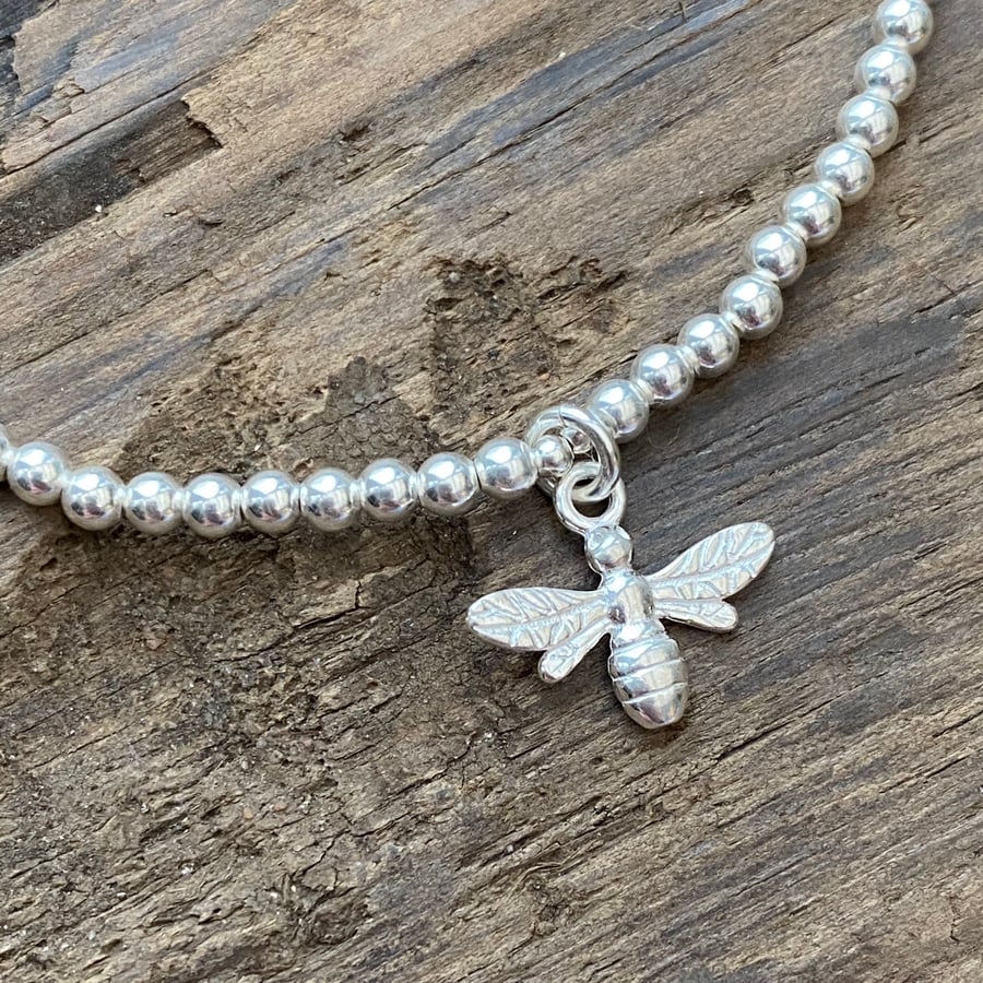 Sterling silver bead bracelet with honey bee charm. Stretch bracelet. 