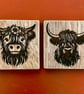 Set of two Highland cow coasters. 