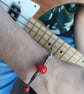 Upcycled and Re-Purposed Red Guitar String Bangle - Image 5