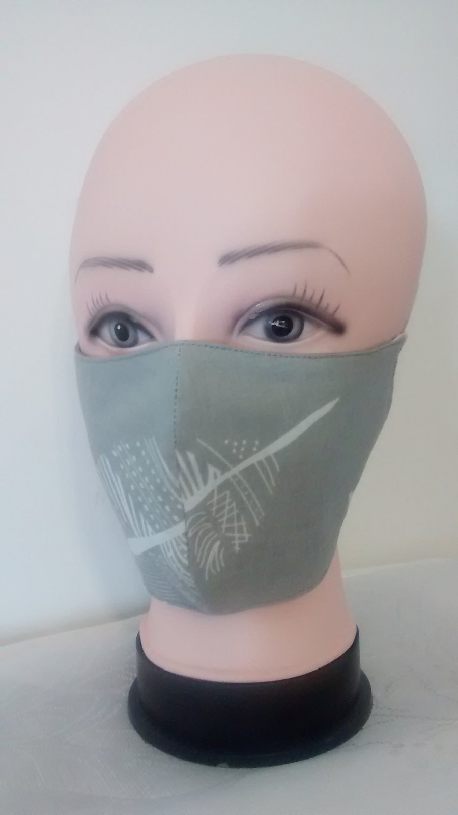 Handmade 3 layers light grey leaf reusable adult face mask.